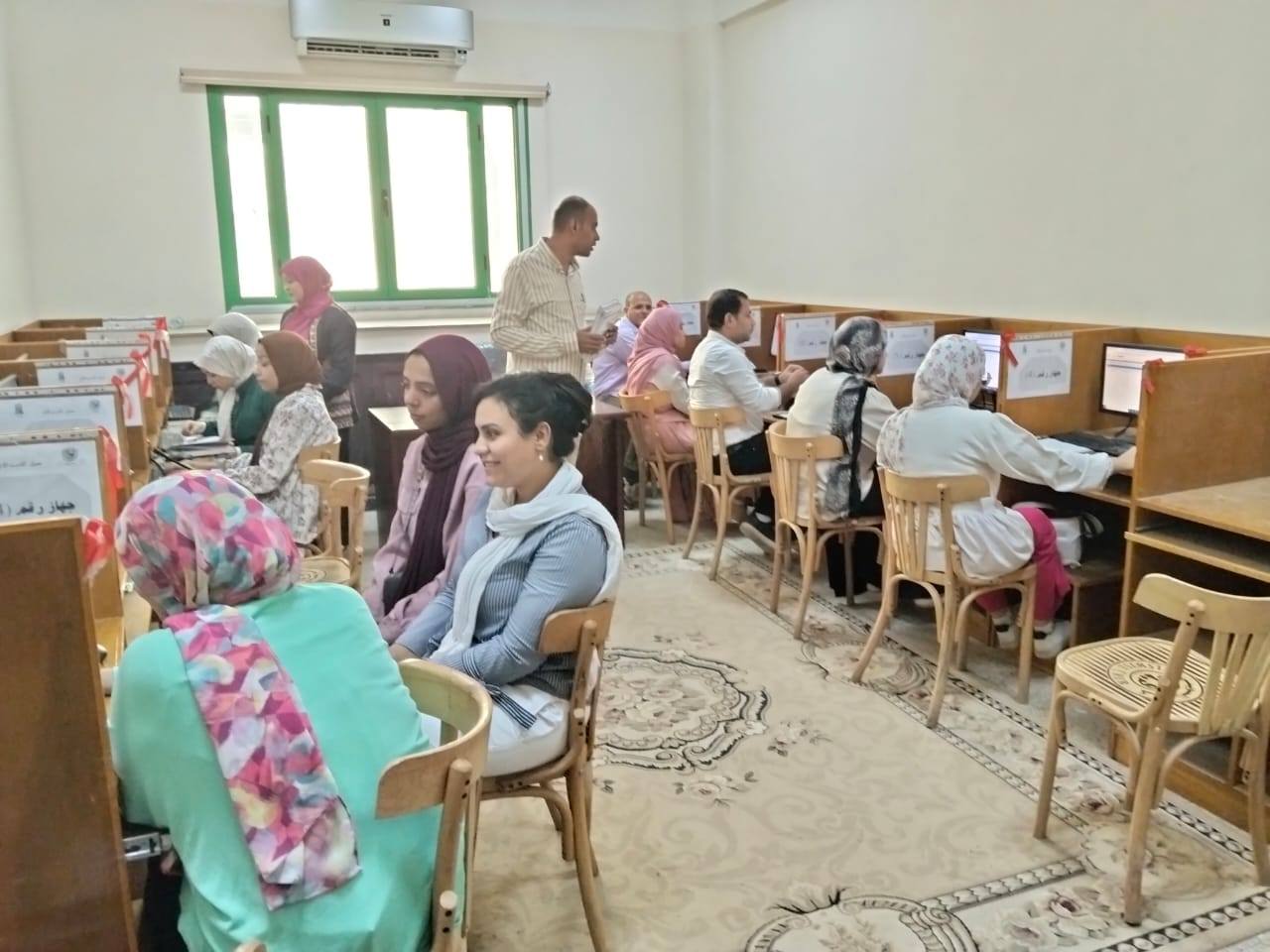 تدريب موظفي المكتبات والهيئة المعاونة على رفع الكتب على موقع المكتبة الإلكترونية